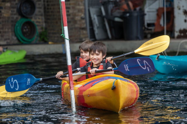 Two boys in a canoe